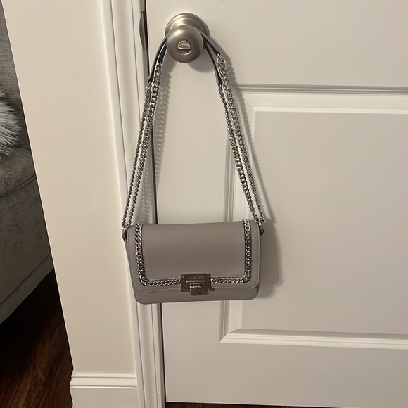 Bought this purse brand new from Michael Kors probably used it twice. Like new - Picture 5 of 5